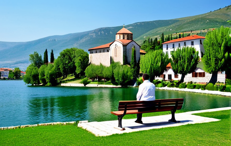 Lakeside Peace**

A serene view of Lake Ohrid, North Macedonia, with the Monastery of Saint Naum in the background. The monastery is nestled amongst lush greenery, with the calm lake reflecting the clear sky. A person in modest clothing sits peacefully on a bench, enjoying the tranquil scenery. Focus on natural light and vibrant colors. Safe for work, appropriate content, fully clothed, professional photography, perfect anatomy, natural proportions, family-friendly.

**